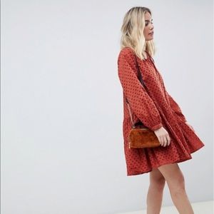 ASOS DESIGN tiered trapeze mini dress in broderie